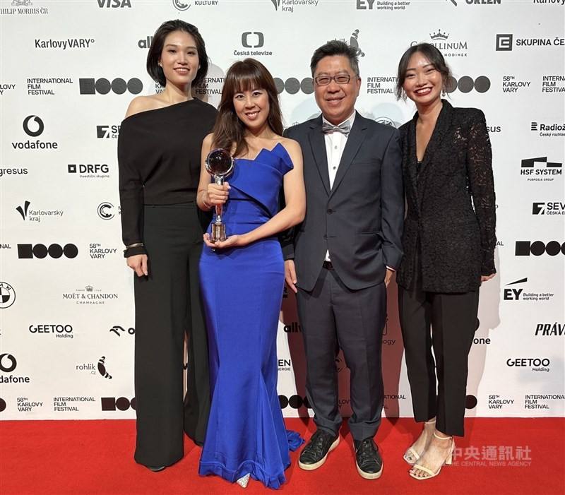 Film director Nelicia Low (second left) is pictured with producers of her film "Pierce" -- Evril Kuo (left), Patrick Mao Huang (second right), and Sam Chua Weishi at the 58th Karlovy Vary International Film Festival on Saturday. CNA photo July 7, 2024