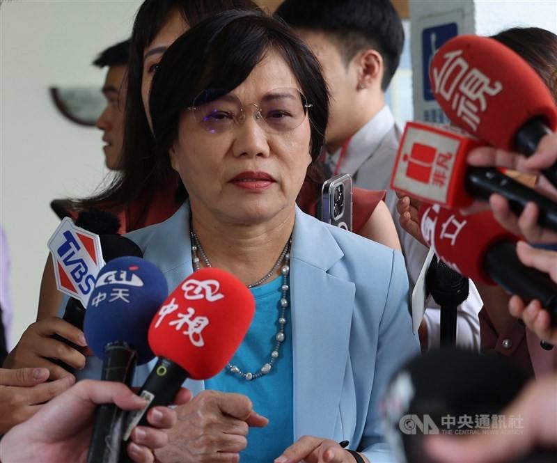 Minister of the Interior Liu Shyh-fang speaks to reporters in front of the Legislative Yuan on Friday.