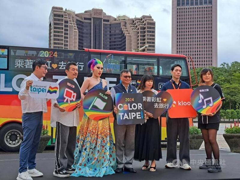 Deputy commissioner of Taipei's information and tourism department Shiue Chiu-huo (center) pose with organizers and performers of Taiwan's upcoming Pride event around the Taipei City Hall on Thursday. CNA photo Sept. 26, 2024