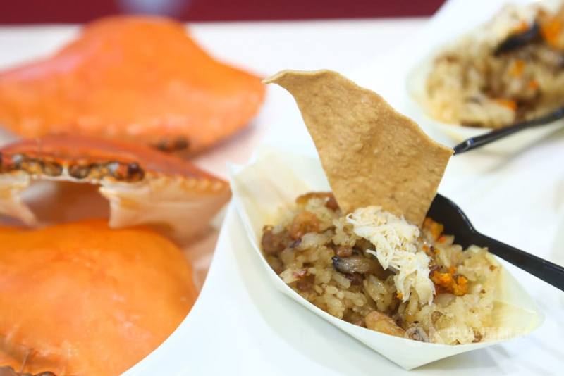 Tainan-based Taiwanese restaurant Asha's steamed giant mud crab with glutinous rice is featured at the National Day reception in Taipei on Thursday. CNA photo Oct. 10, 2024