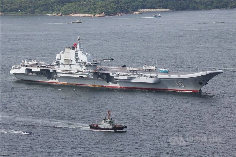 A Chinese Liaoning Carrier accompanied by other ships.