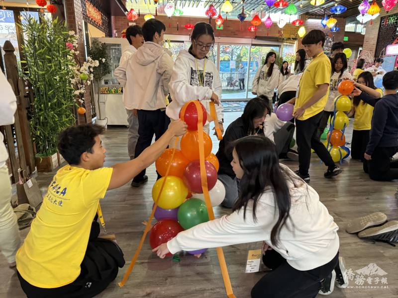 Teamwork challenge to build the tallest ball tower.