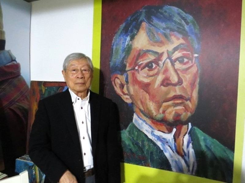 Cheng Tzu-tsai (鄭自才) and his self-portrait. CNA photo Jan. 3, 2025