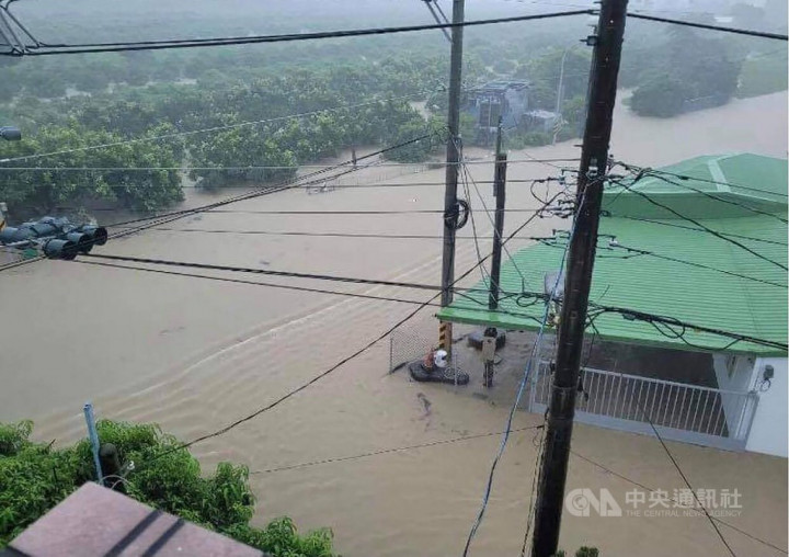 A highway along a mountainous area of Fangliao in Pingtung is seen drenched in rainwater Sunday. 