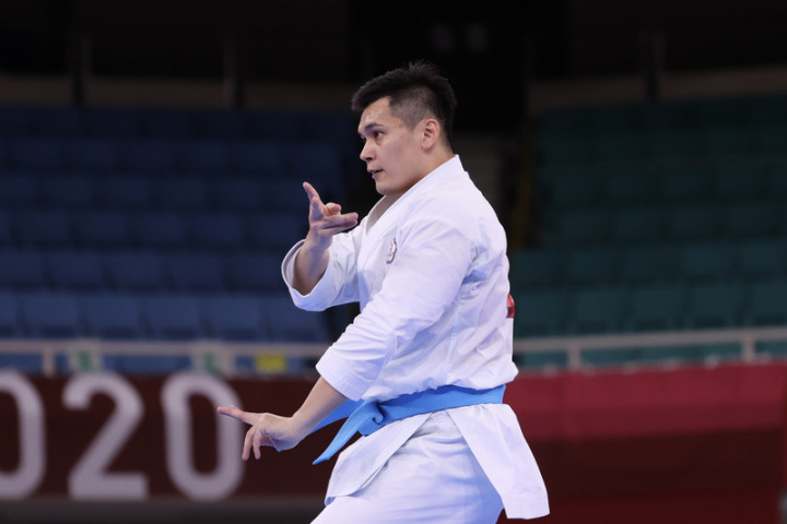 台灣選手王翌達6日出賽東京奧運空手道男子個人型項目，準備兩套Kata（型），分組排名第5，無緣晉級。圖為王翌達展示第2套型安南大（Anan Dai）