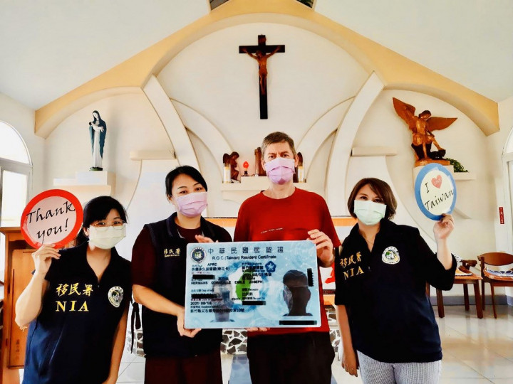 Father Joseph Emile Corneille Hermans (second right).