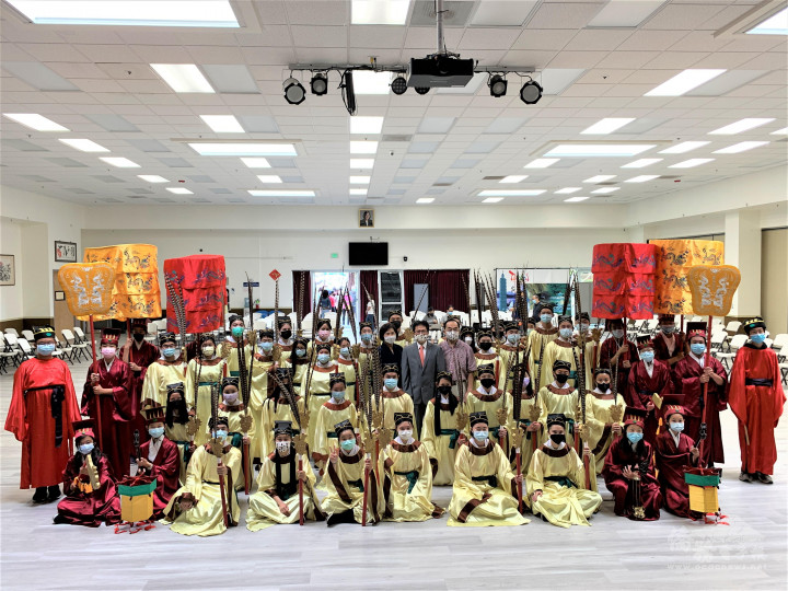 Dancers, deacons. and musicans pose for a group photo