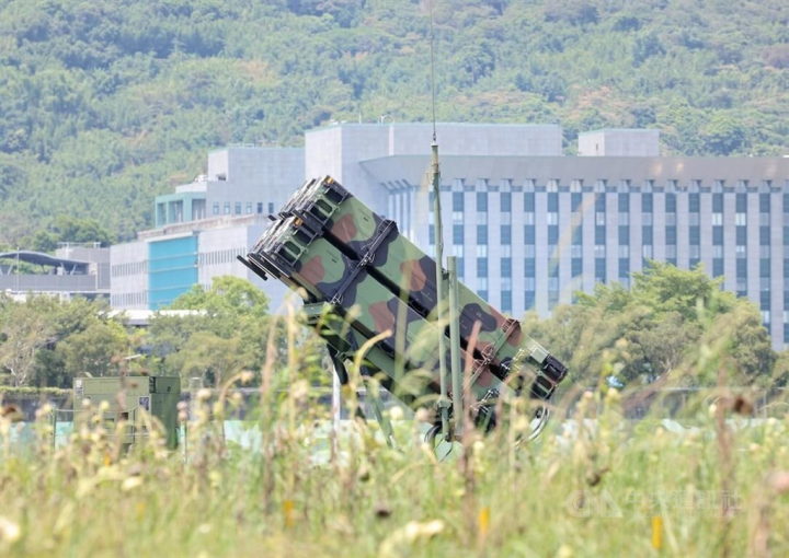 A mobile Patriot missile launcher is pictured by the Keelung River in Taipei Wednesday during the annual Han Kuang exercises. 