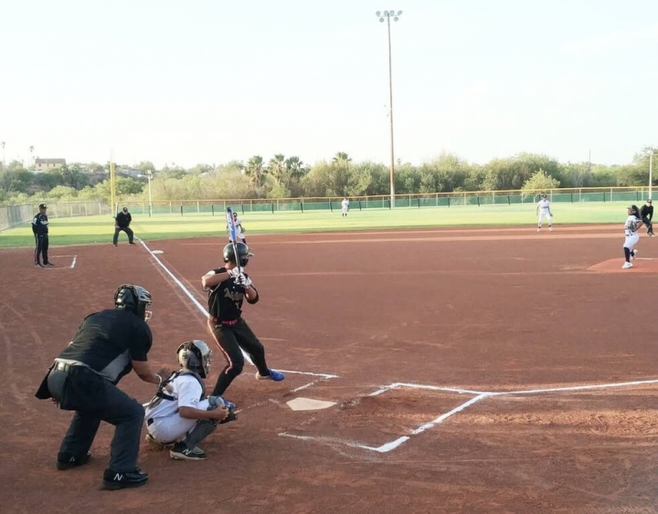 A Taiwanese player (in black) is ready to bat. Photo courtesy of Jhong-Jheng Elementary School