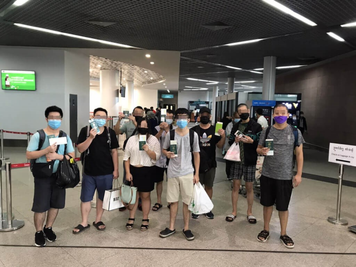 Nine of the 11 victims are pictured at Phnom Penh Airport before taking a flight back to Taiwan on Monday. Photo courtesy of Taiwan's representative office in Ho Chi Minh City Sept. 5, 2022