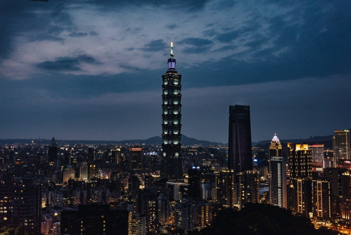 An aerial view of Taipei showing the Taipei 101 skyscraper in the distant background.