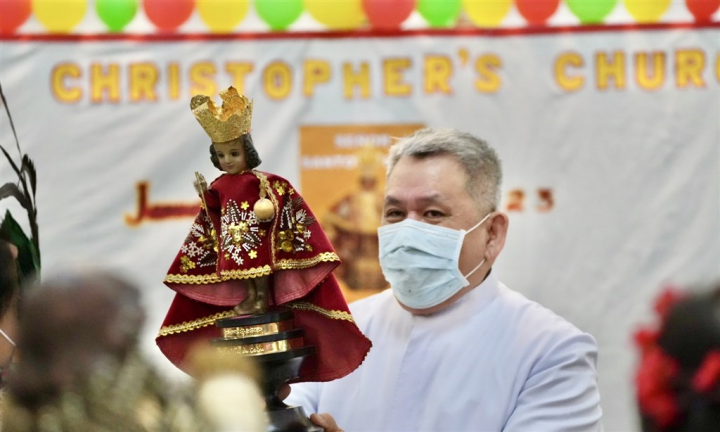 Saint Christopher's Church parish priest Father Edward Pacquing holds a replicated image of the Santo Niño de Cebu. CNA photo Dec. 29, 2023