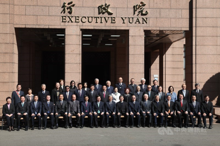 Premier Chen Chien-jen (front row, center) and members of the new Cabinet pose for group photos in front of the Executive Yuan building in Taipei on Tuesday. CNA photo Jan. 31, 2023