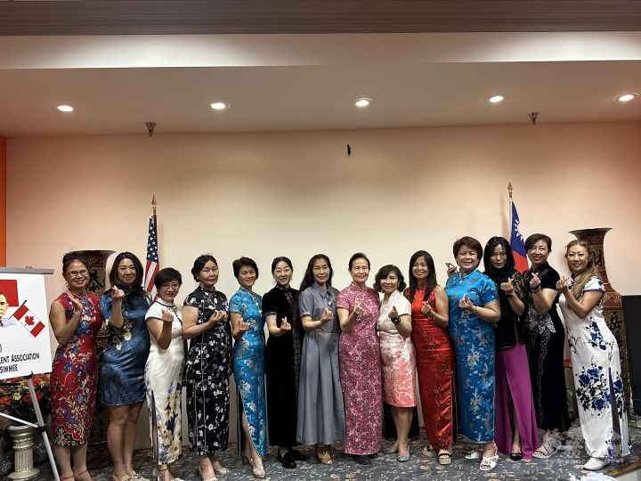 Ladies attended this event in Qipao dress with great care.