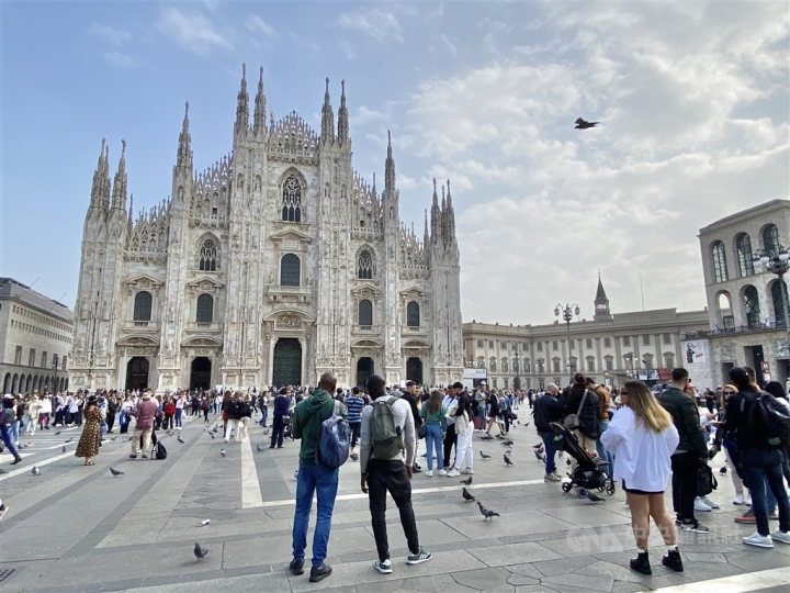 Visitors look at the Milan Cathedral, one of the Italian city's attractions in this photo taken in October 2022.