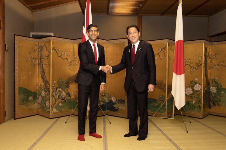 British Prime Minister Rishi Sunak (left) and Japanese Prime Minister Fumio Kishida exchange a handshake ahead of their dinner in Hiroshima, Japan on Thursday. Photo courtesy of British Prime Minister's Office
