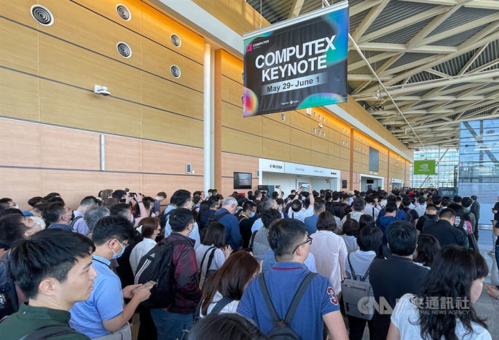 Attendees flood in to attend a keynote speech delivered by Nvidia founder and CEO Jensen Huang during his at Computex 2023 in Taipei on Monday. 