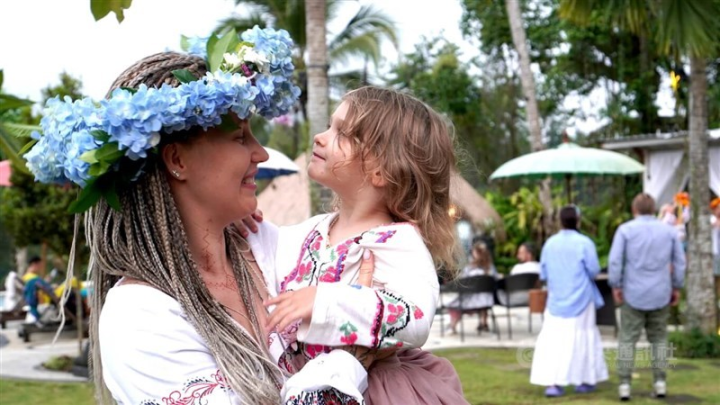 A Ukirainian woman and her kid are seen in this recent photo taken in Bali, Indonesia. CNA photo July 25, 2023