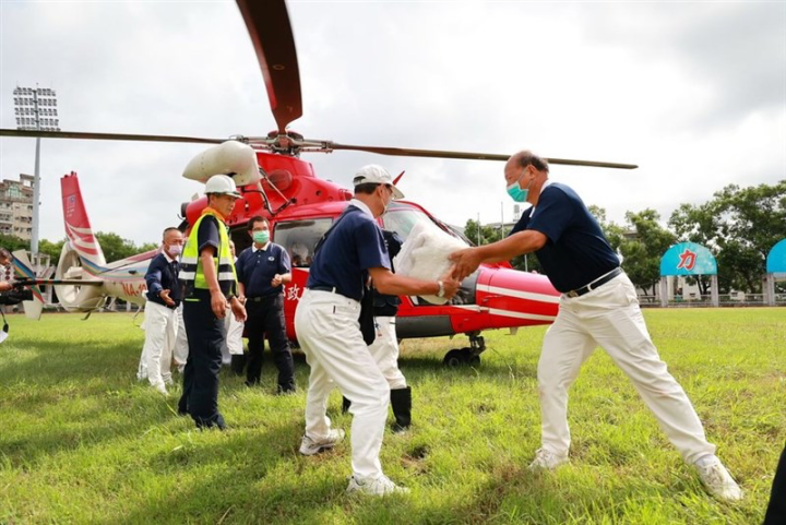 olunteers load supplies onto a National Airborne Service Corps helicopter in this photo released on Sunday. Photo courtesy of the Nantou County government Aug. 6, 2023