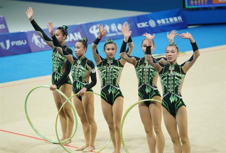 Taiwan's women's rhythmic gymnastics team waves to the audience at the FISU World University Games in Chengdu, China on Monday. Photo courtesy of Chinese Taipei University Sports Federation July 31, 2023