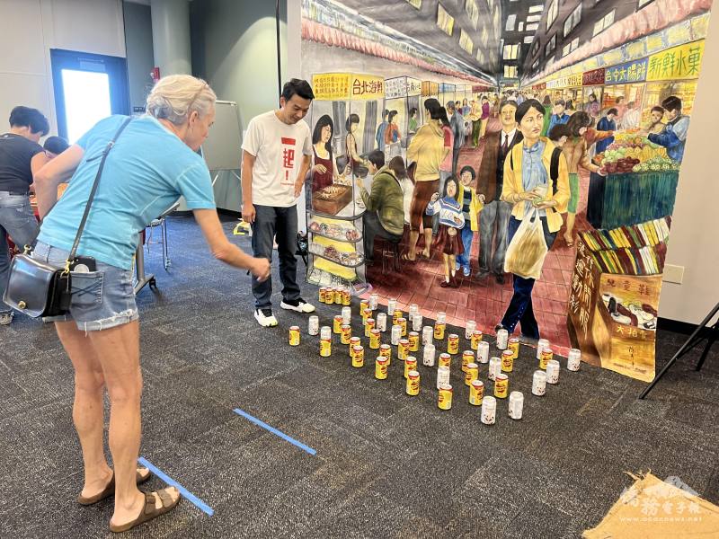 套圈圈遊戲與陳秀芳女士的畫作