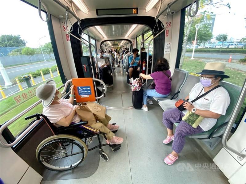 Passengers on a Kaohsiung tram ride the public transportation with masks on in this CNA file photo for illustrative purpose only.