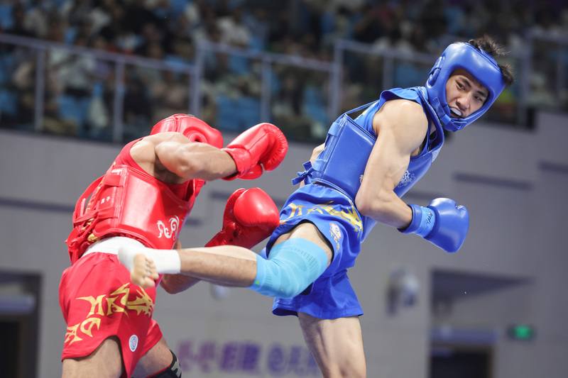 杭州亞運台灣好手張煥宜（藍）27日晚間在武術散打男子70公斤級4強賽，不敵伊朗選手穆赫辛．穆罕默德賽義菲（Mohsen MOHAMMADSEIFI）（紅），獲得銅牌。