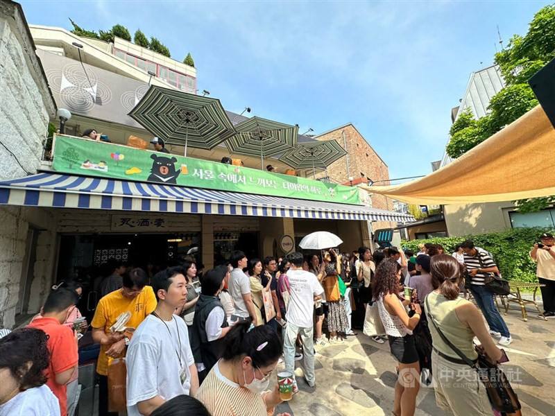 Some Koreans visit a tourism event held by Taiwan's tourism bureau in Seoul on June 17, 2023.
