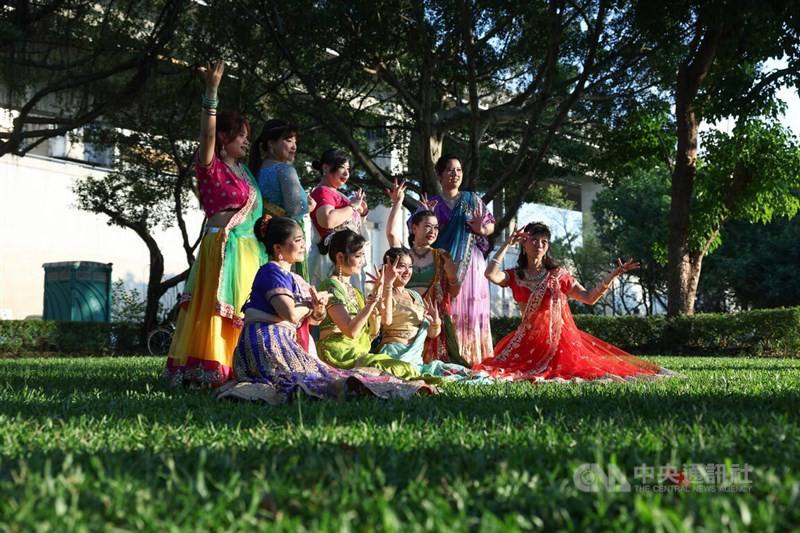 Local Diwali attendees don on saris in observation of Diwali on Sunday.