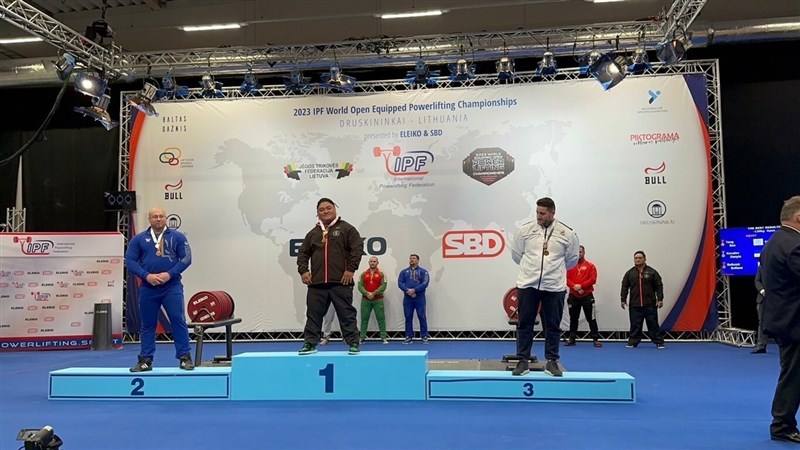 Taiwanese powerlifter Yang Sen (center) stands on the podium following his record-breaking performance at the 2023 World Open Equipped Powerlifting Championships in Lithuania. Photo courtesy of Sports Administration Nov. 19, 2023