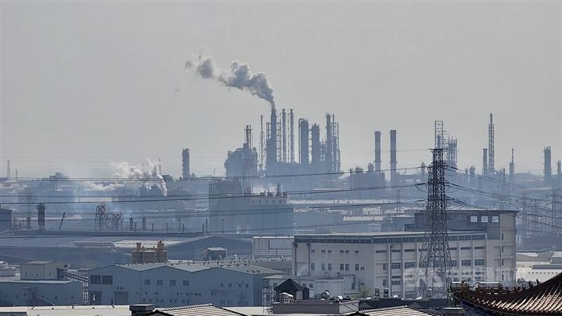 Plumes of smoke emerge from an industrial area in Kaohsiung on March 17, 2023.