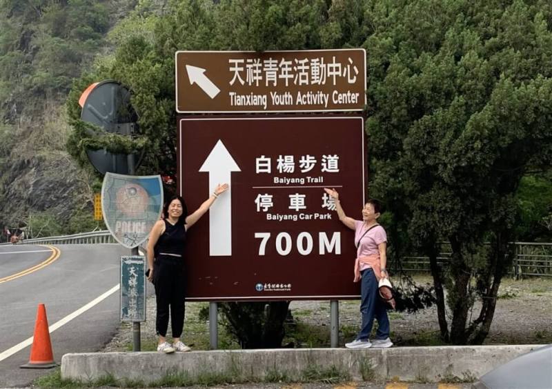 Dimitris Belbas's wife Monica Tsai (left) and his mother-in-law pose for photo after they left the badly damaged trail in Hualien County. Photo courtesy of Charles Tsai April 8