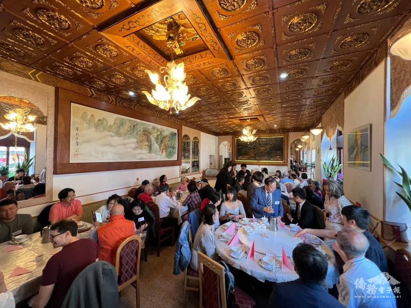 The atmosphere at the dinner event was warm and friendly.