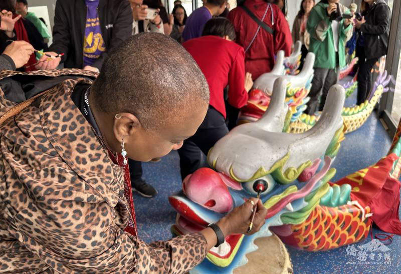 The traditional eye-dotting of the dragons