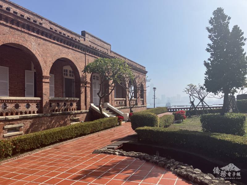 The bright orange-red brick of the British Consulate is offset by the trim verdant hedges of the garden and the brilliant blue skies of Kaohsiung’s seaside view.