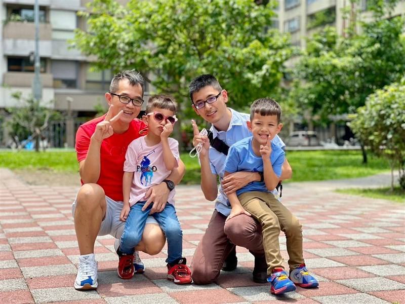 Gary (left), Peter and their children Samson and Mayson at a park in Taipei. CNA photo June 15, 2024