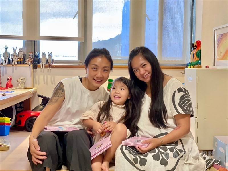 City (left), Doby and Mota at their home in Taipei. CNA photo June 15, 2024