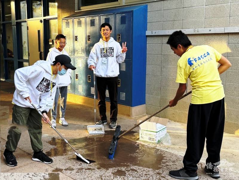 Helping clean up after event.
