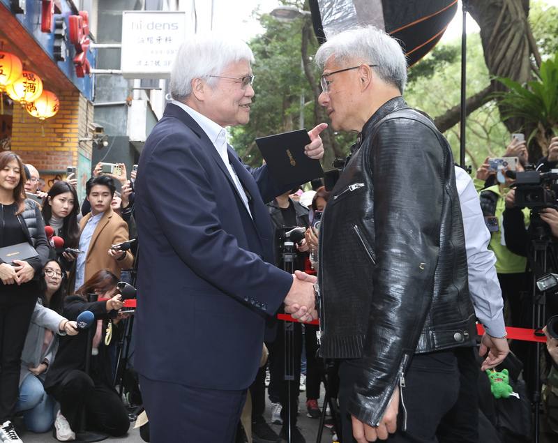 Nvidia CEO Jensen Huang (front right) and TSMC Chairman C.C. Wei (front left) exchange a handshake following their lunch. CNA photo Jan. 18, 2025