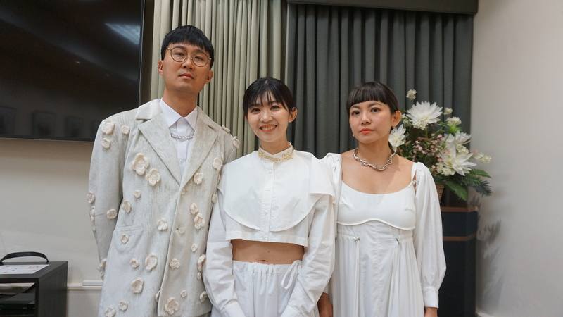 Lee Pei-tzu (center) poses with members of the experimental band iWhooiWhoo. CNA photo Feb. 1, 2025