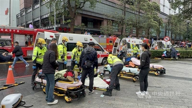 First responders tend to victims following a suspected gas explosion at a Shin Kong Mitsukoshi department store in Taichung on Thursday. CNA photo Feb. 13, 2025