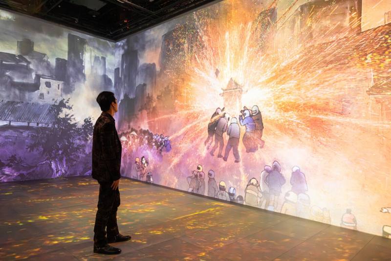 沉浸式展覽「臺灣風物圖—穿越時空沉浸之旅」首映會19日在台北舉行，展覽以藝術家許文融巨幅水墨畫卷「臺灣風物圖」為起點，展現台灣各地風土民情。（双融域提供）