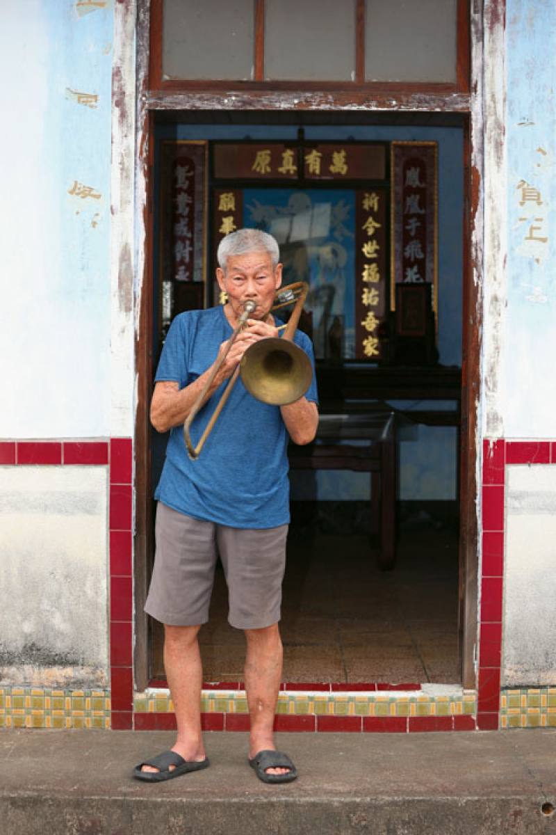 Huang Heming was a member of the third generation of the Luocuo Church xiyuedui. His eyes light up as he recalls his days playing with the band.
