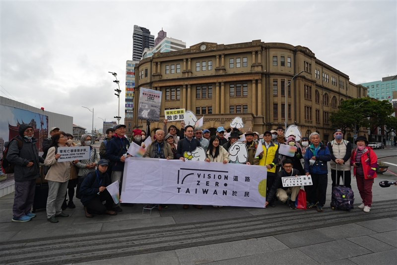 Participants of a “walking festival” organized by the road safety group Vision Zero Taiwan take a group photo before the event begins in Taipei Saturday. Photo courtesy of Vision Zero Taiwan Feb. 22, 2025