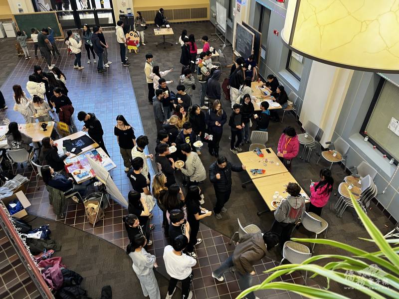 Attendees of Taste of Taiwan gather at the various food and game booths.