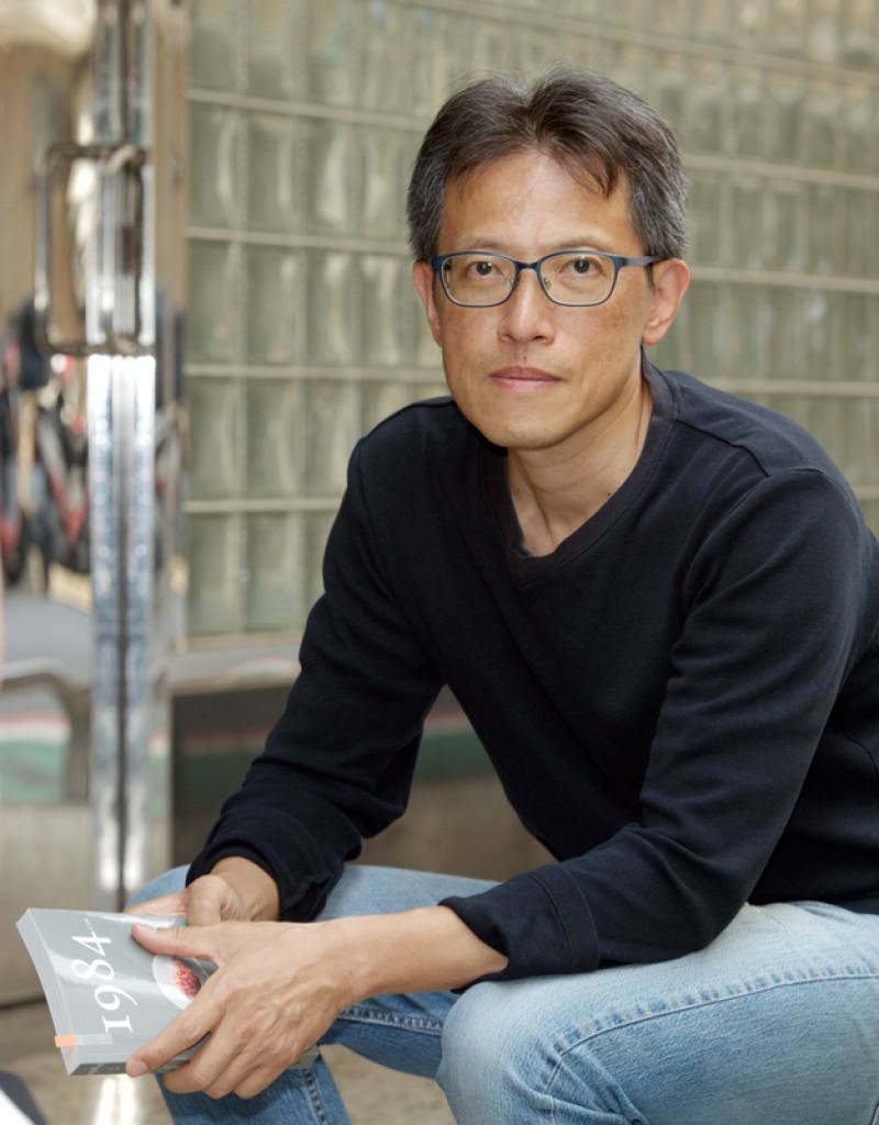 Amateur translator Tsiu Ing-sing holds a copy of his Taiwanese translation of "Nineteen Eighty-Four." CNA photo April 12, 2025