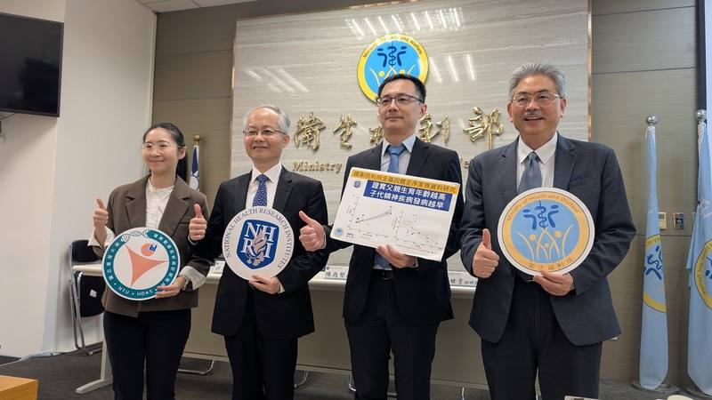 Researchers and officials who worked on the NHRI study pose for a photo at a Monday presser. CNA photo May 5, 2025