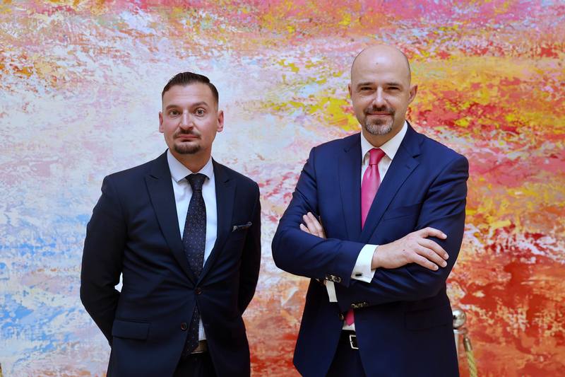 Zbigniew Pisarski (right) and Tomasz Smura (left), two experts from the Polish think tank Casimir Pulaski Foundation, speak to CNA on May 14 during their visit to Taiwan. CNA photo