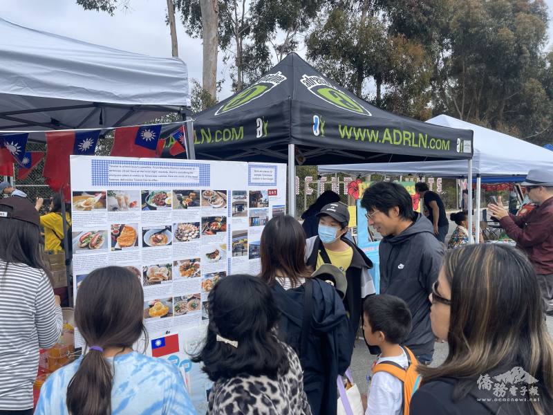 A large, vibrant display introducing iconic Taiwanese foods and travel destinations.