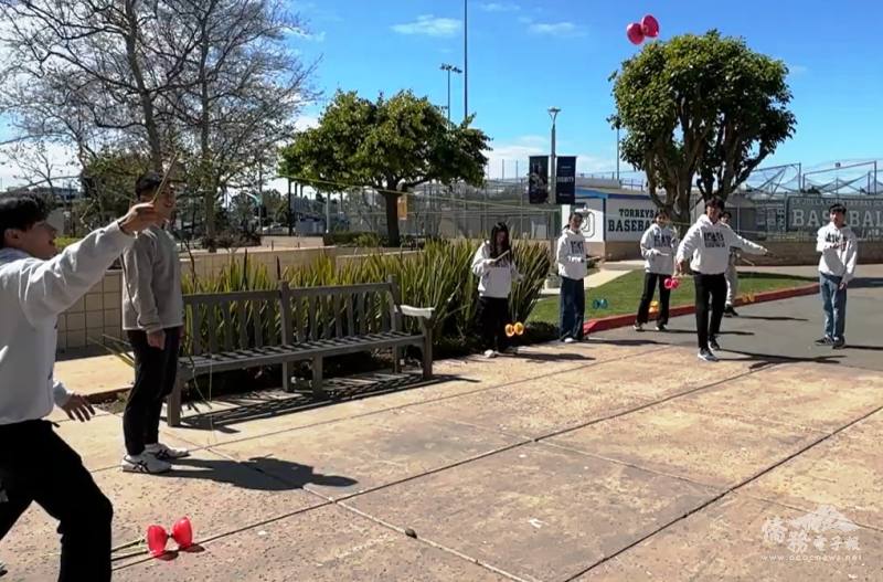 FASCA-SD members practice diabolo techniques under the guidance of instructor Michael Chen.